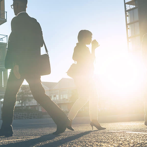 Financial experts walking in an urban environment thinking about inspirational DeFi products